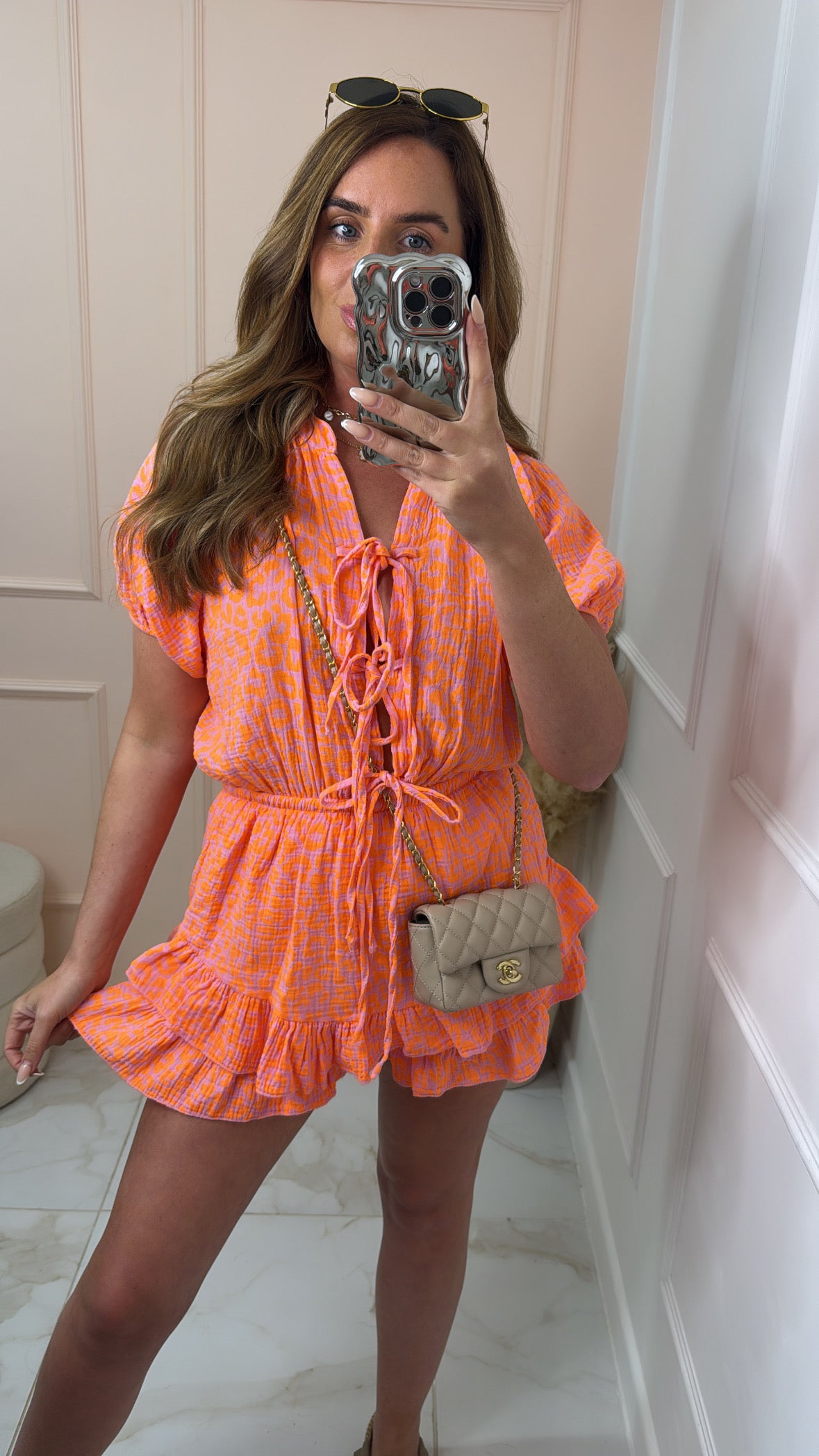 BECCA orange leopard tie front playsuit