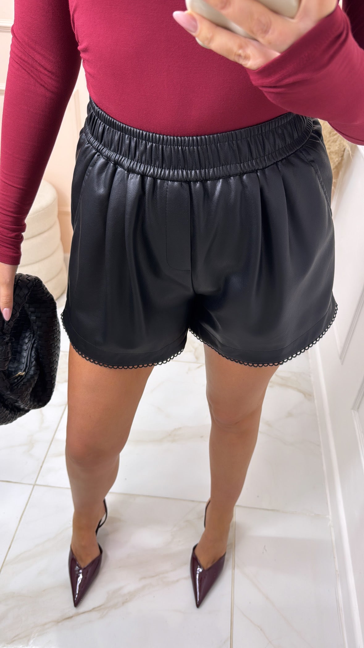 ELLA black PU scallop trim runner shorts