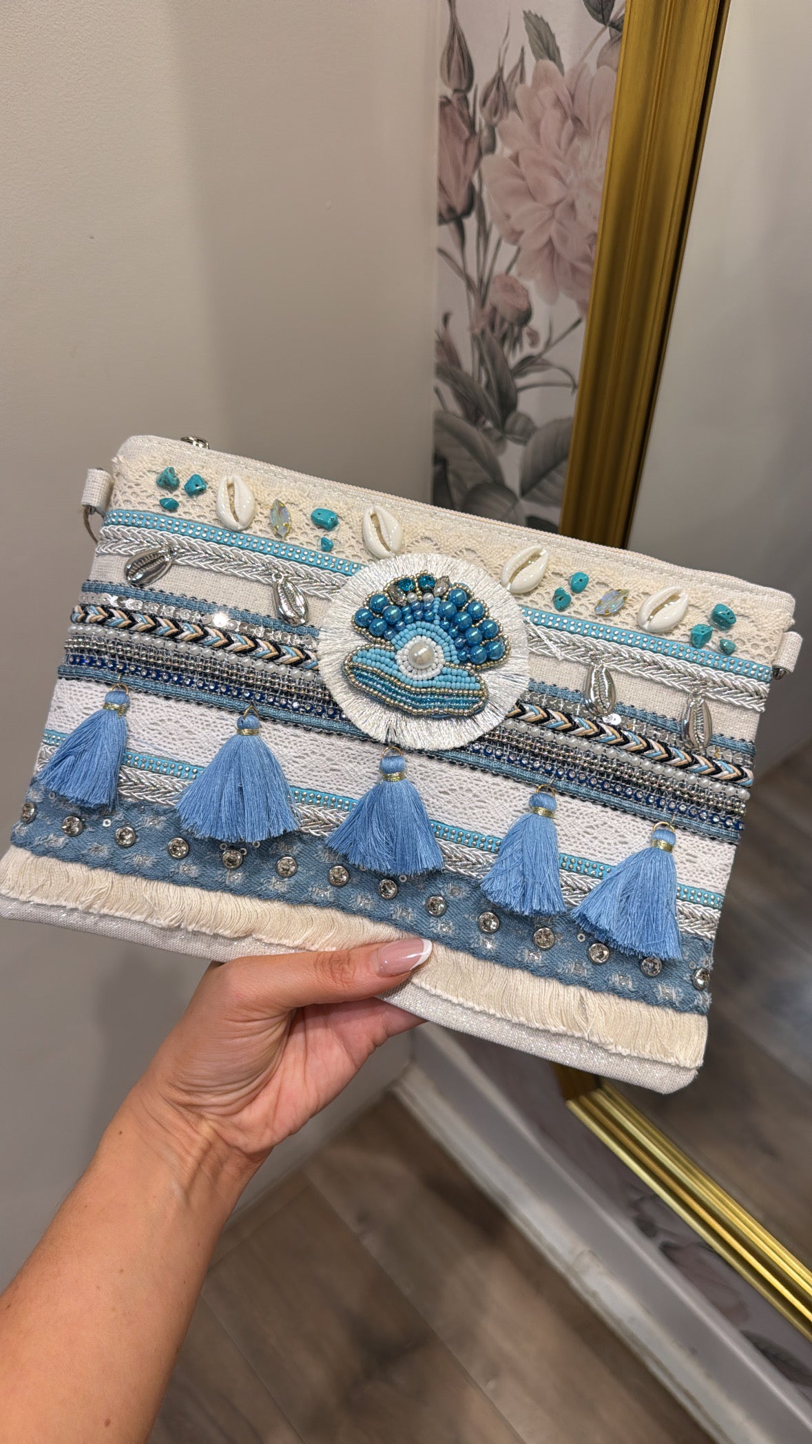 MAISIE blue tassel embellished clutch bag