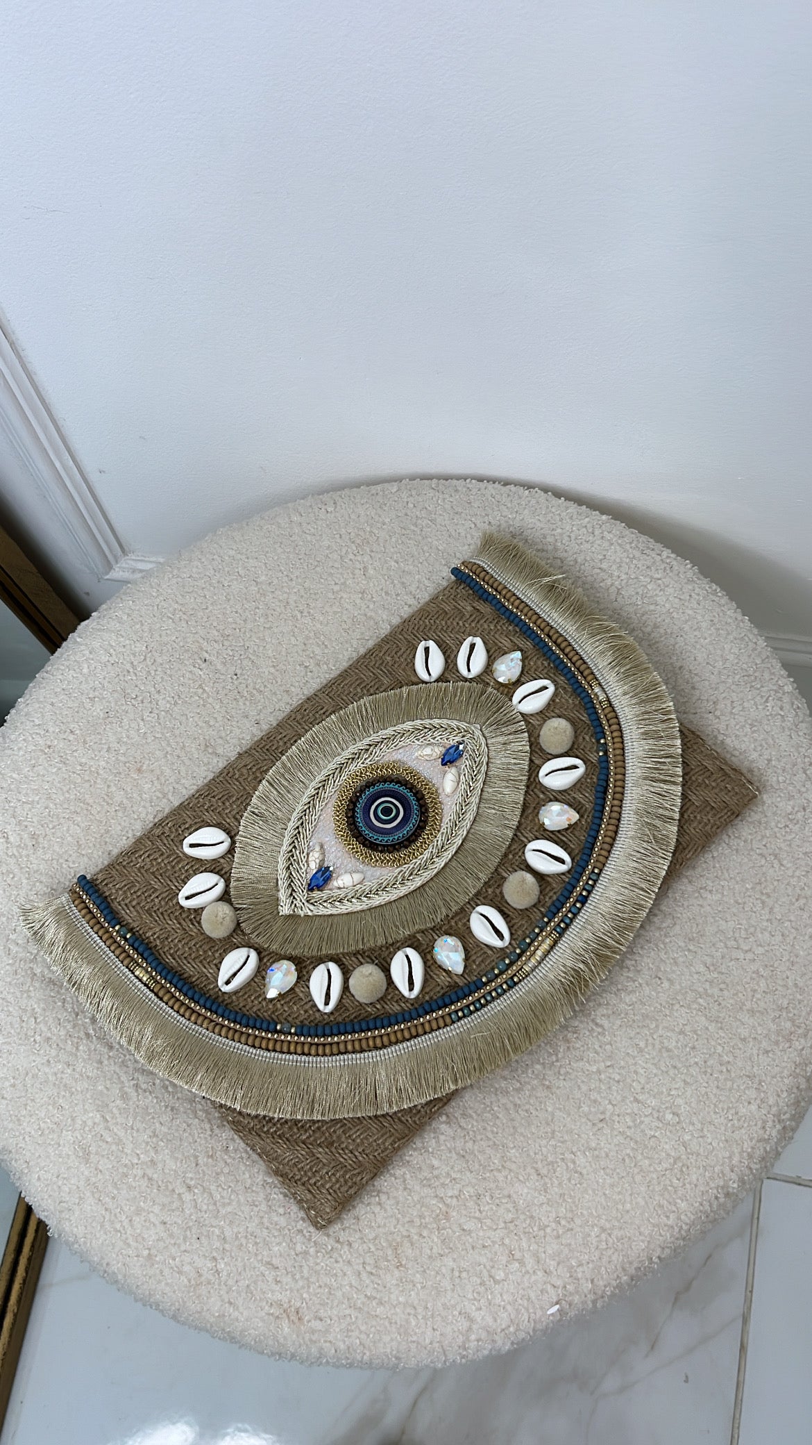 TIA beige evil eye clutch bag