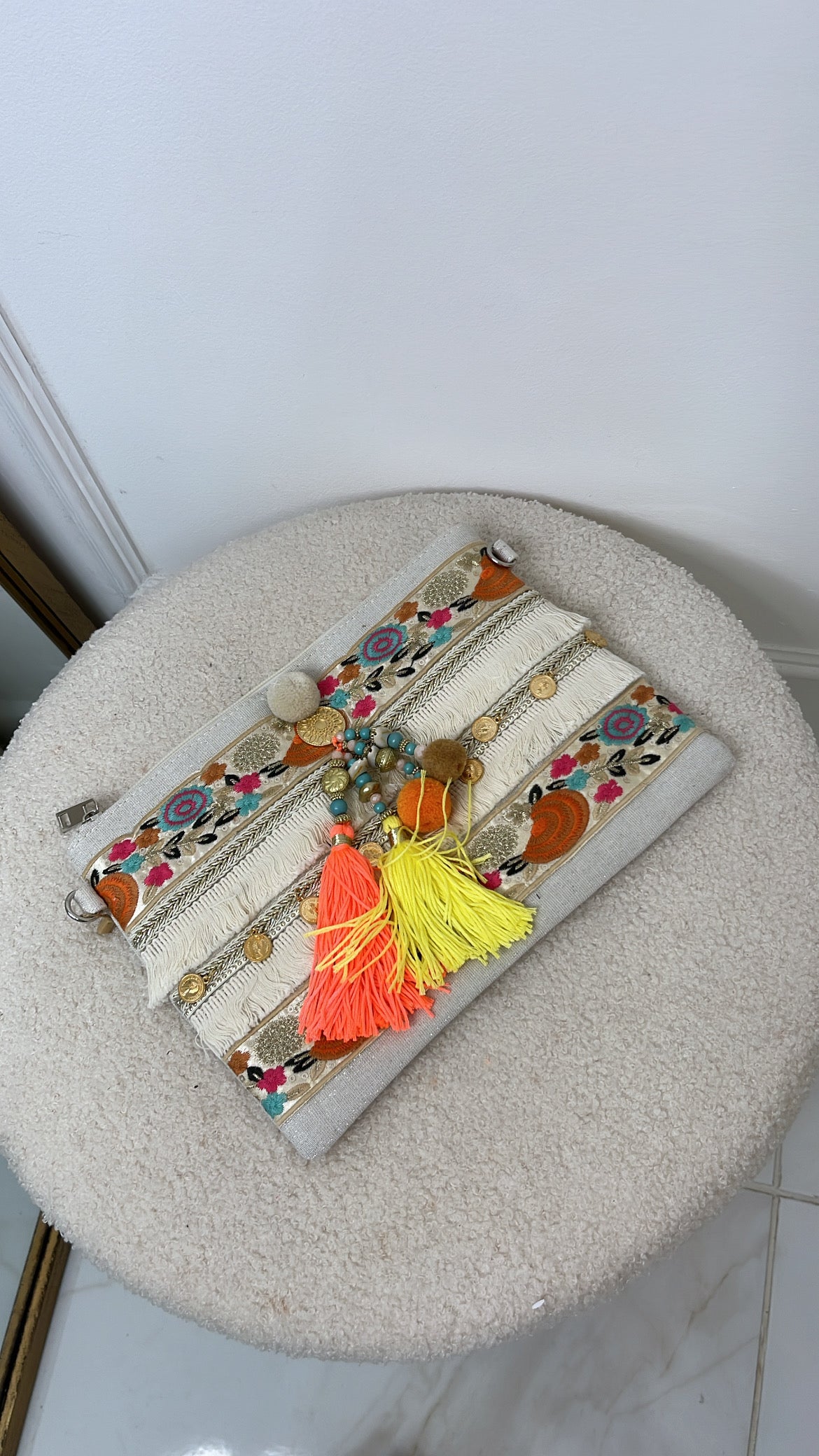 ABBY multi pom pom clutch bag