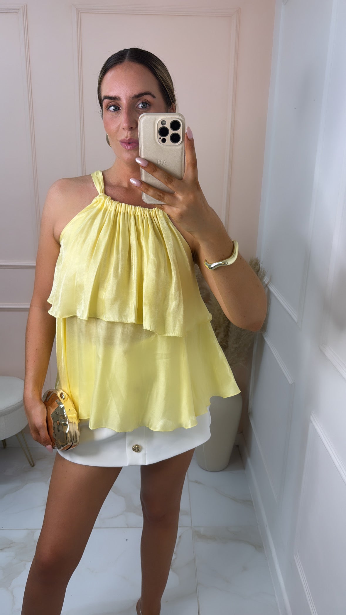 BECCA lemon silky tiered top