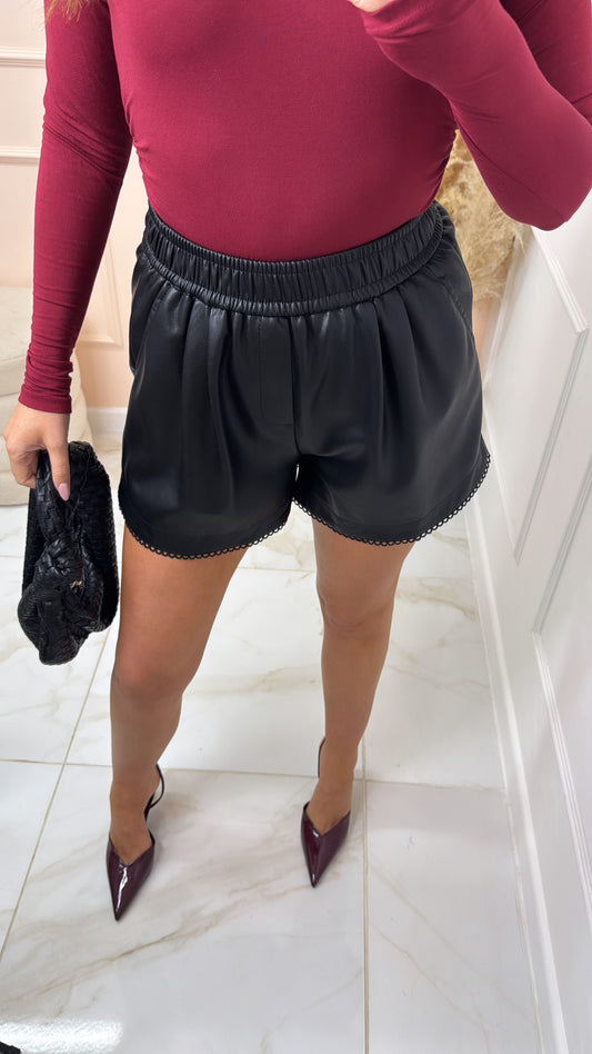 ELLA black PU scallop trim runner shorts