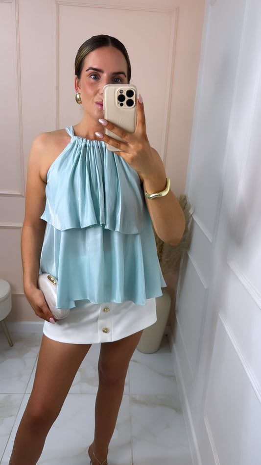 BECCA teal silky tiered top