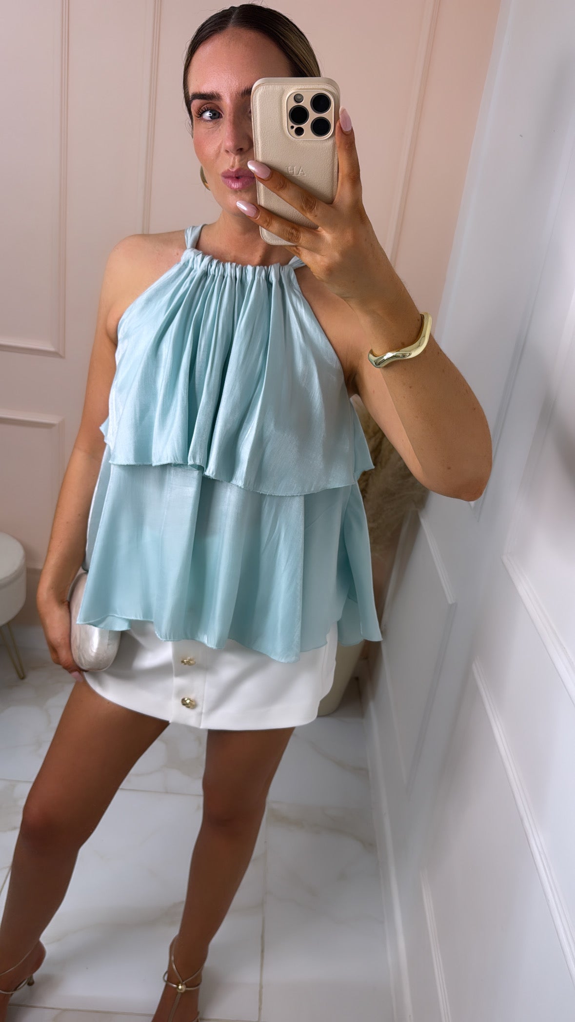 BECCA teal silky tiered top