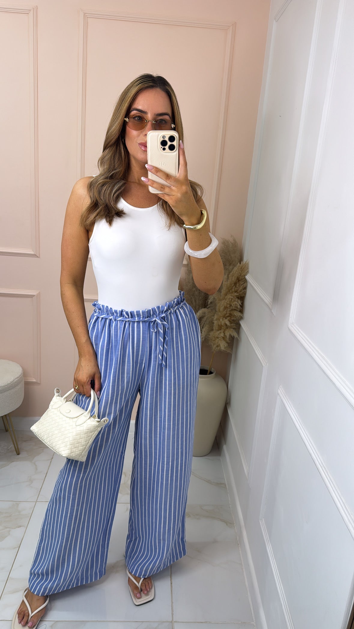 ADA blue pinstripe paperbag trousers