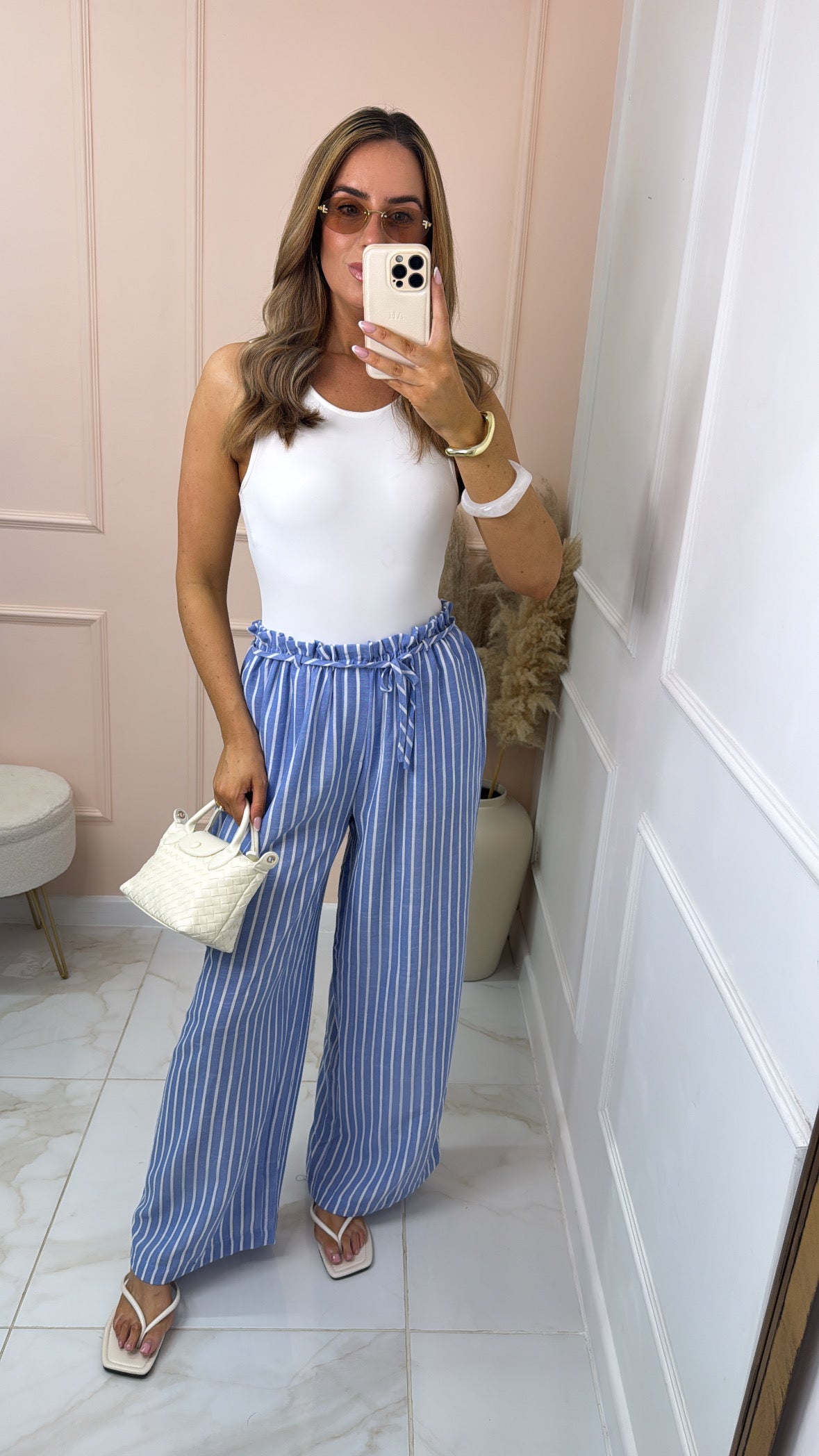 ADA blue pinstripe paperbag trousers