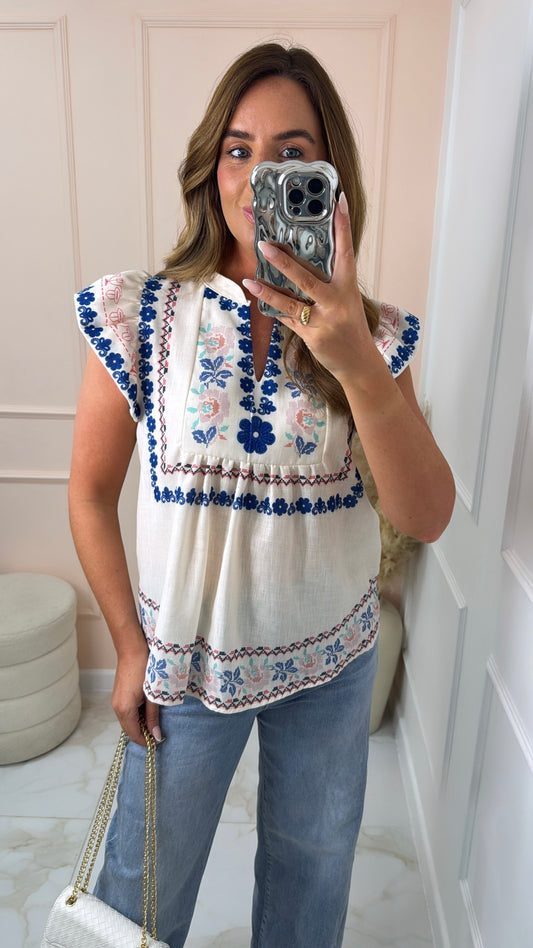 CHERYL blue folk print frill blouse